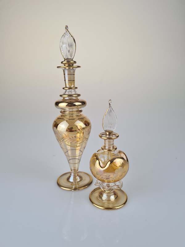 Two Egyptian glass perfume bottle